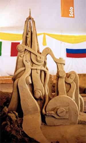 completed sand sculpture electric feather